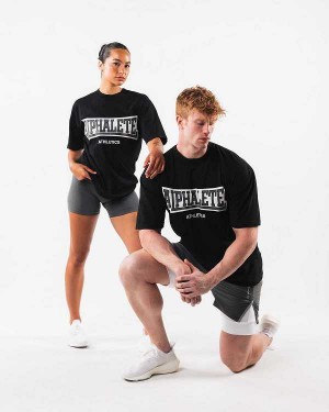 Black Unisex Alphalete Varsity Short Sleeve Shirts | UAE-079325