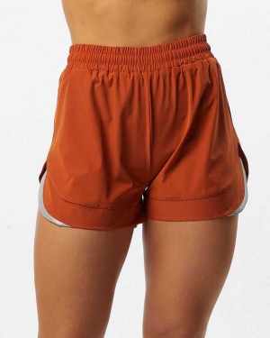 Dark Orange Women's Alphalete Stride 3" Shorts | UAE-603548